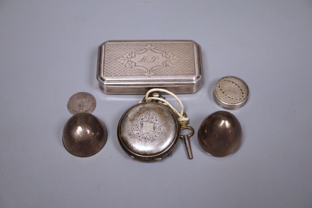 A French white metal snuff box, two other boxes including egg shaped, a Russian spoon, silver fob watch and a coin.